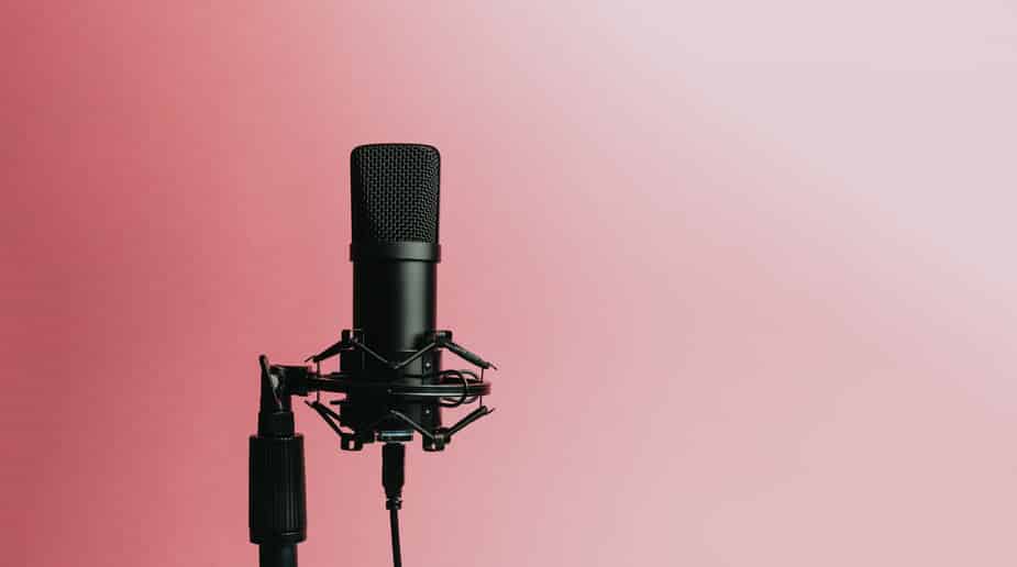 single-microphone-on-pink-wall
