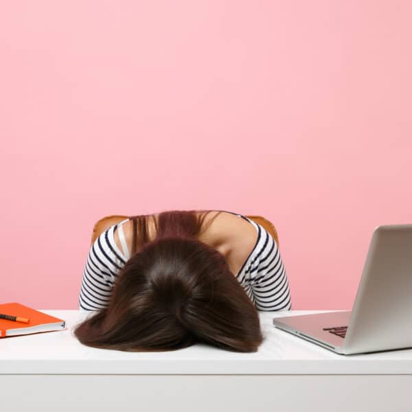 Woman upset at job.